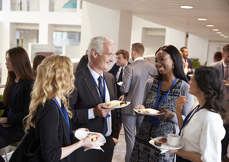 A group of people at a networking event